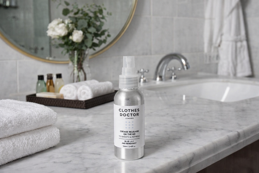 Crease Release on the Go Spray in hotel bathroom