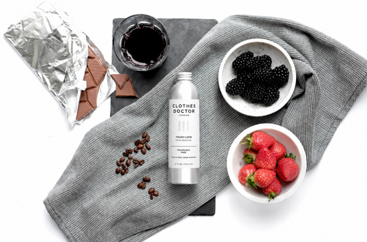 Tough love stain remover with berries and trousers