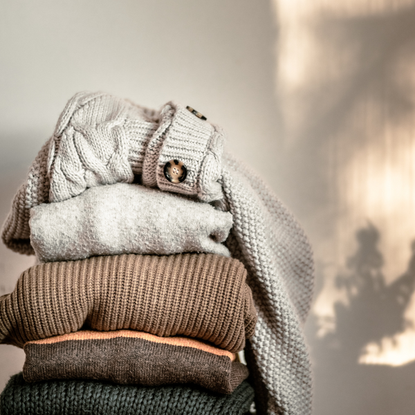 Home Wardrobe with Winter Clothes. Woolen Sweaters and Dried Lavender for  Protection from Moth Stock Photo - Image of pile, folded: 230732522