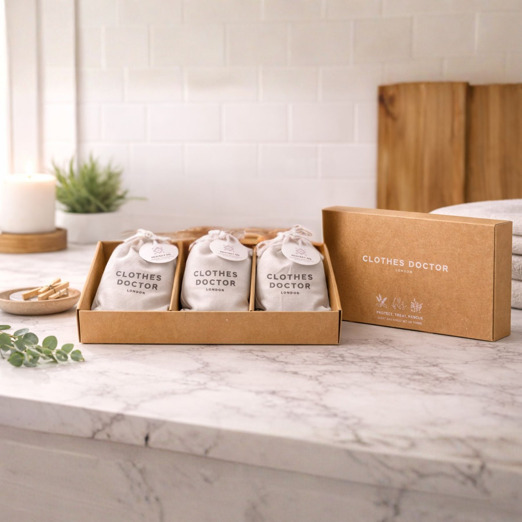 Clothes Doctor packaging on a marble countertop with a neutral background